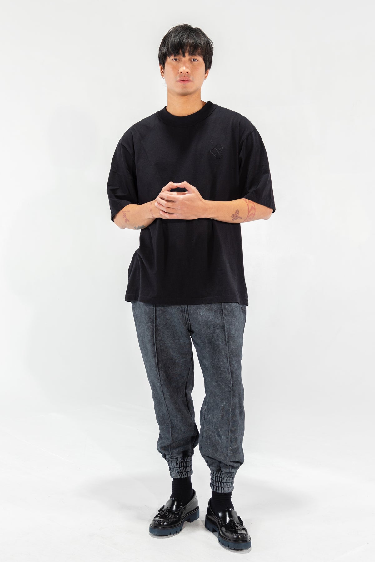 Black Broad Collar Tee shown on model, front view