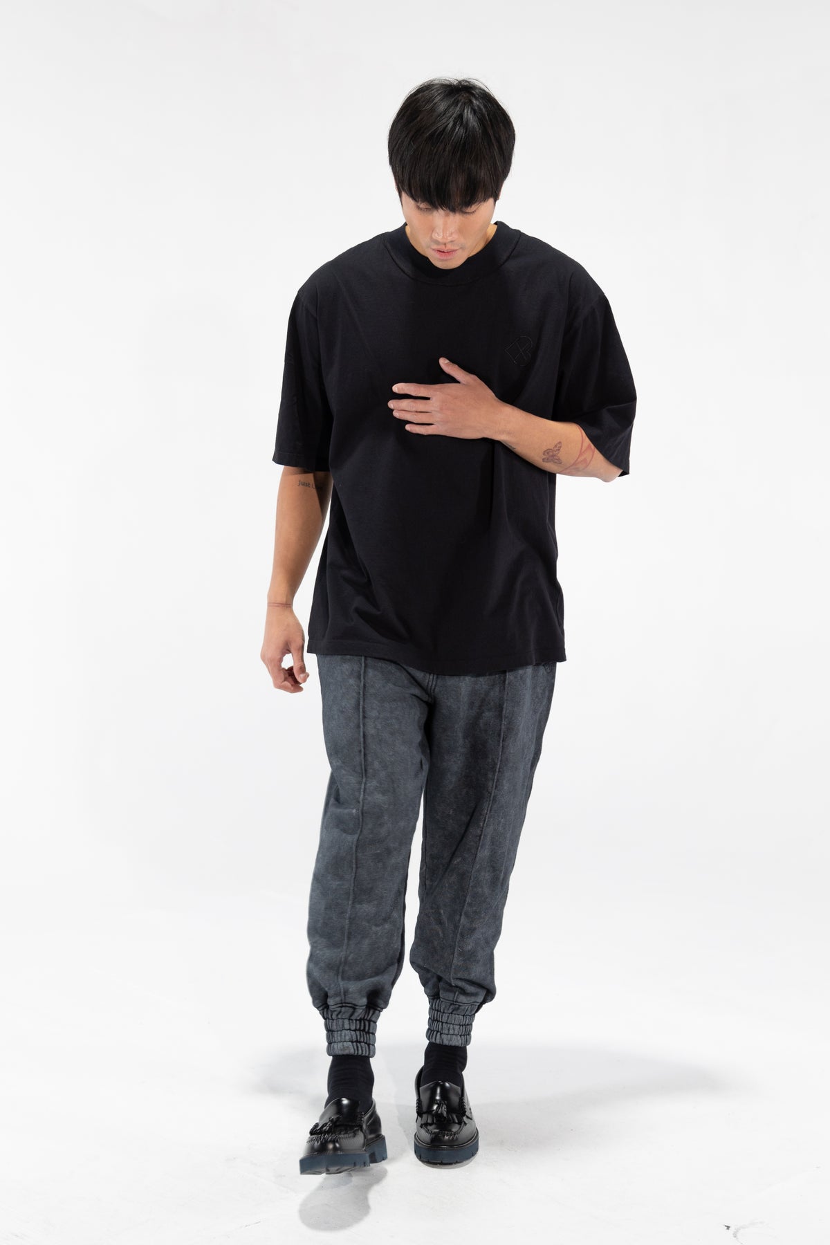 Black Broad Collar Tee shown on model, relaxed front view