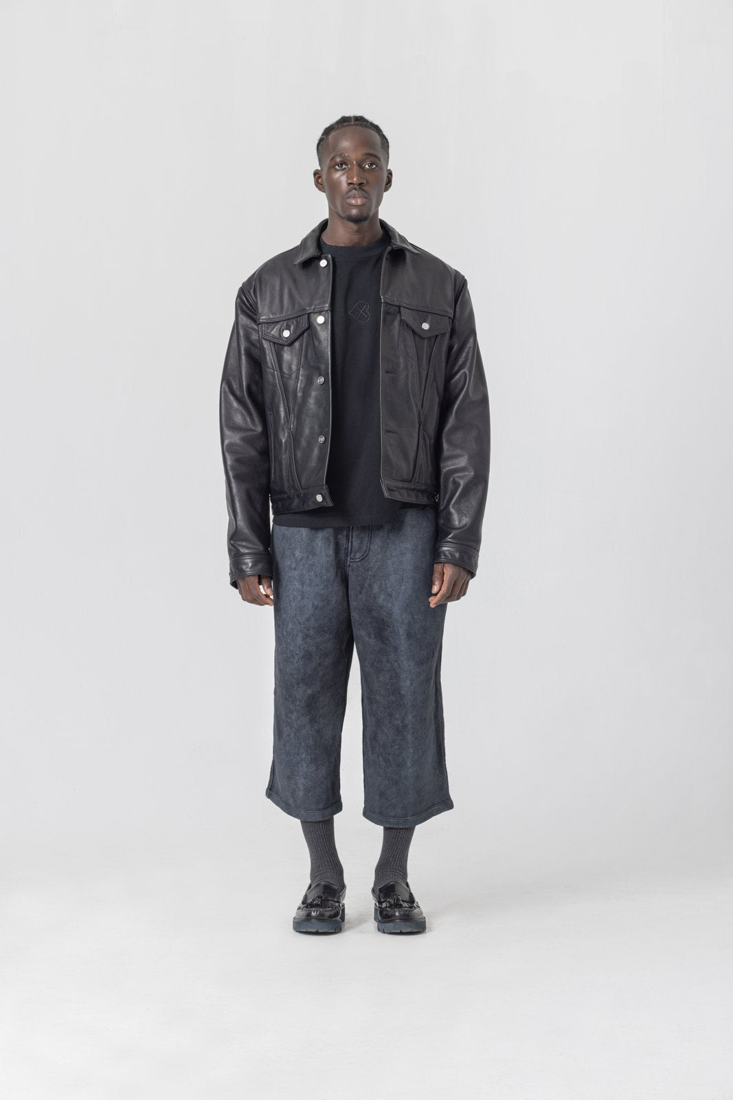 Leather trucker jacket — front view on model